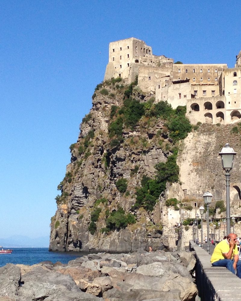 The Aragonese Castle rising from the sea at Ischia