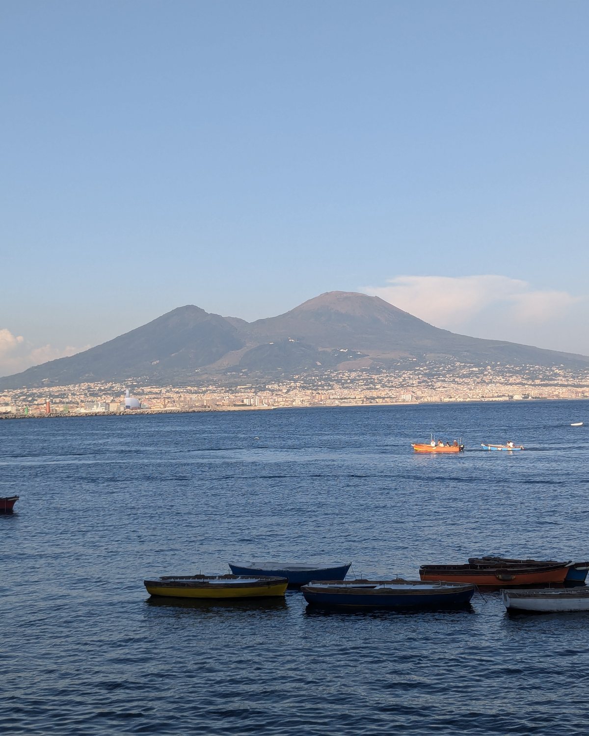 Vesuvius across the Bay of Naples, fishing boats in the foreground